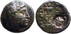 Ancient Coins - Seleukid Kings. Antiochos II Theos AE17 Apollo / Tripod Altar. facing head countermark