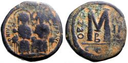 Ancient Coins - Justin II & Sophia AE25 Follis. Constantinople. overstruck on sestertius