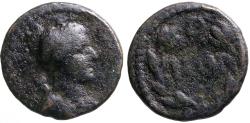 Ancient Coins - Pisidia, Isinda AE14 Artemis or Apollo / ΙΣΙΝ in wreath