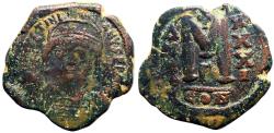 Ancient Coins - Justinian I AE30 Follis.  Facing bust.  Constantinople.  year 31