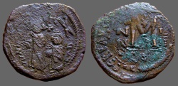 Ancient Coins - Heraclius & Heraclius Constantine AE30 Follis overstruck on Maurice Tiberius facing bust follis
