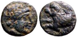 Ancient Coins - Pisidia, Komana AE12 Zeus / Lion springing left
