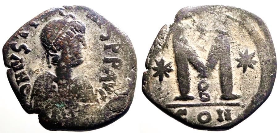 Ancient Coins - Justinian I AE32 Follis. Chi Rho & 2 star. Constantinople