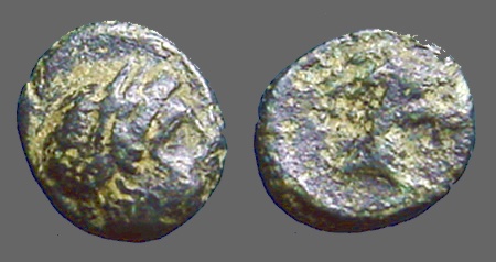 Ancient Coins - Aeolis, Aigai, AE11 Laureate head of Apollo / Head of goat right.   3rd Cent. BC.
