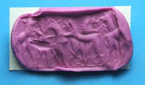 Ancient Coins - Late Babylonian hard stone cylinder seal.  C. 800-600 BC.