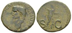 Ancient Coins - Claudius AE27 As Minerva Striding Right Brandishing Javelin Shield in Left Hand