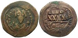 Ancient Coins - Byzantine Empire. Phocas. Æ Follis. Overstruck on a Follis of Maurice Tiberius.
