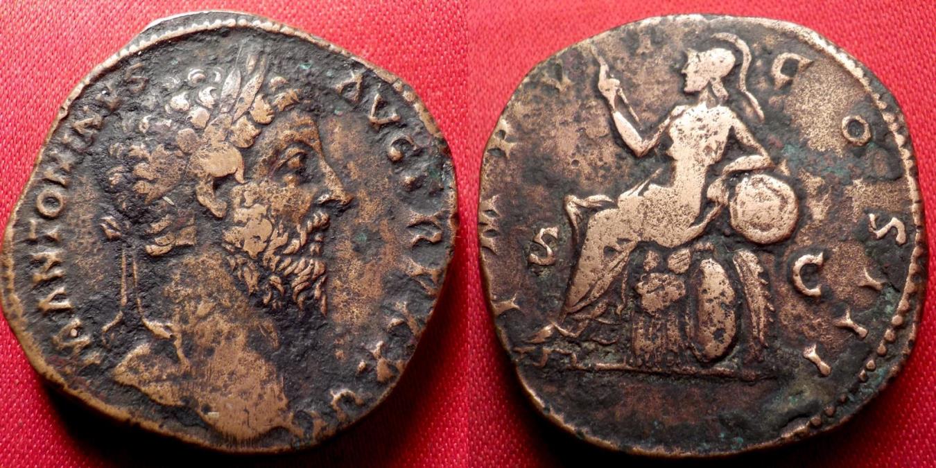 180 Ad Rome MARCUS AURELIUS AE sestertius. Rome, 180 AD. Roma seated on cuirass ...