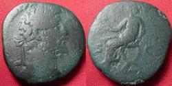 Ancient Coins - COMMODUS AE sestertius. Emperor seated left on curule chair, holding branch & scepter.