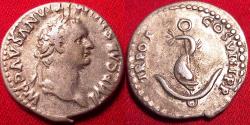 Ancient Coins - DOMITIAN AUGUSTUS AR silver denarius. Early issue, 82 AD. Dolphin coiled around anchor. Rare.