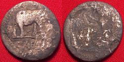 Ancient Coins - JULIUS CAESAR fouree denarius. Elephant trampling serpent. Four priestly implements.