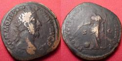 Ancient Coins - COMMODUS AE sestertius. Rome, 183 AD. Providentia standing, holding long scepter, and wand over globe set on ground.