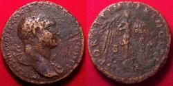 Ancient Coins - TRAJAN AE sestertius. Victory standing right, inscribing VIC DAC on shield set on palm tree.