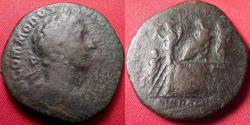 Ancient Coins - COMMODUS AE sestertius. Fourth Liberalitas, 181 AD. Emperor on platform, Liberalitas beside, citizen below holding up fold of toga