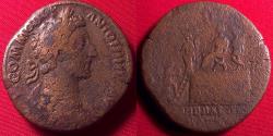 Ancient Coins - COMMODUS AE sestertius. Third Liberalitas donative, 180 AD. Emperor on platform, Liberalitas beside, citizen below holding up fold of toga