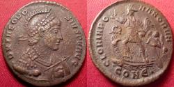 Ancient Coins - THEODOSIUS I AE2. Constantinople mint. GLORIA ROMANORUM, Emperor & Victoria on galley. Helmeted bust, holding spear & shield.