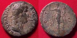 Ancient Coins - HADRIAN AE as. Roma standing right, foot on helmet, holding spear & cornucopia.