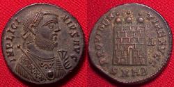 Ancient Coins - LICINIUS I silvered follis. Heraclea mint. City gates, three turrets, right facing bust in imperial mantle.