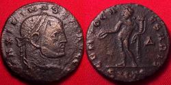 Ancient Coins - MAXIMINUS II as FILIUS AUGUSTORUM, AE follis. Thessalonica. Genius standing. Very rare.