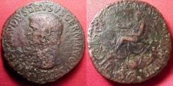 Ancient Coins - NERO CLAUDIUS DRUSUS AE sestertius. Claudius seated, scattered arms at his feet.