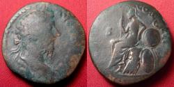 Ancient Coins - MARCUS AURELIUS AE sestertius. Rome, 180 AD. Roma seated on cuirass, resting elbow on round shield