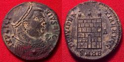Ancient Coins - LICINIUS I follis. Heraclea mint. City gates, three turrets, right facing bust in imperial mantle.