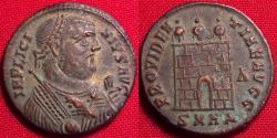 Ancient Coins - LICINIUS I silvered follis. Heraclea mint. City gates, three turrets, right facing bust in imperial mantle.