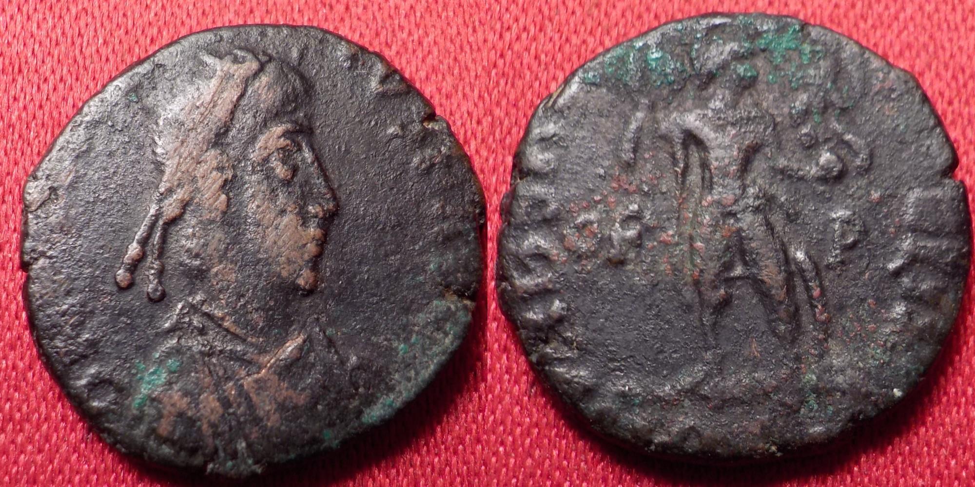 HONORIUS AE3. Rome, 402-408 AD. URBS ROMA FELIX, Roma standing, OF P in ...