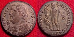 Ancient Coins - LICINIUS I AE silvered follis. IOVI CONSERVATORI AVGG, Jupiter with captive at his feet. Antioch
