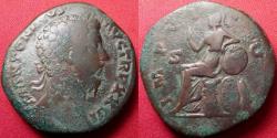 Ancient Coins - MARCUS AURELIUS AE sestertius. Rome, 180 AD. Roma seated on cuirass, resting elbow on round shield