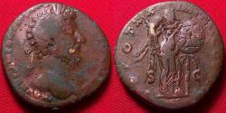 Ancient Coins - MARCUS AURELIUS AE sestertius. Victoria standing, setting inscribed shield on palm tree. VIC PAR