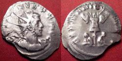 Ancient Coins - GALLIENUS AR silver antoninianus. Struck at Lugdunum. Victory, standing on globe, between captives. VICT GERMANICA.