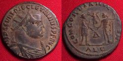 Ancient Coins - DIOCLETIAN AE post-reform radiate fraction. Alexandria mint, Jupiter presenting Victory to Diocletian