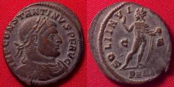 Ancient Coins - CONSTANTINE I AE follis. Arles mint. SOLI INVICTO COMITI, Sol standing.