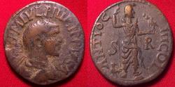 Ancient Coins - PHILIP I AE 24mm radiate. Mên wearing Phrygian cap, foot on bucranium, cockerel beside