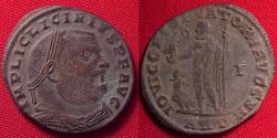 Ancient Coins - LICINIUS I AE follis. Antioch. IOVI CONSERVATORI AVGG N, Jupiter standing, eagle at his feet.