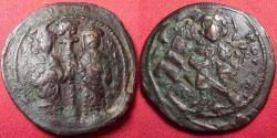 Ancient Coins - CONSTANTINE X COMNENUS & EUDOCIA AE follis. Christ standing. Overstruck on earlier anonymous follis.