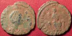 Ancient Coins - AELIA EUDOXIA AE follis. Constantinople, 395-401 AD. Empress seated on throne, crowned by hand of God. Bust of Empress, also crowned by God. Rare.