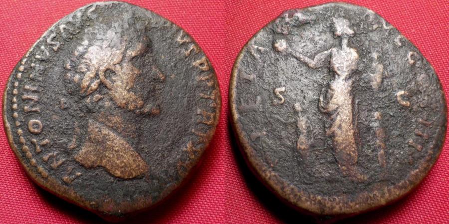 ANTONINUS PIUS AE sestertius. Pietas standing, with three children & globe