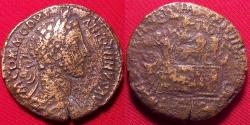 Ancient Coins - COMMODUS AE sestertius. Fourth Liberalitas, 181 AD. Emperor on platform, Liberalitas beside, citizen below holding up fold of toga
