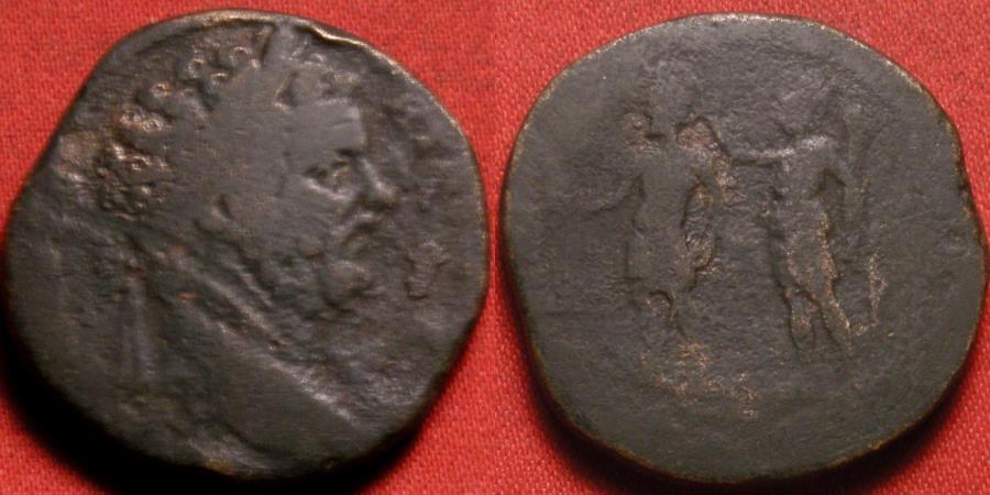 Ancient Coins - SEPTIMIUS SEVERUS AE sestertius. Severus being crowned by Roma. Scarce 'reverse adoptive' type where Severus places himself in the Antonine dynasty.