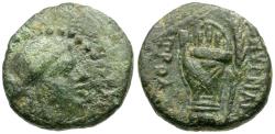 Ancient Coins - Ionia. Smyrna. Iatrodoros, magistrate Æ15 / Hand in Caestus