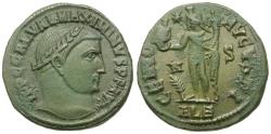 Ancient Coins - Maximinus II Daia (AD 310-313) Æ Follis / Genius holding head of Serapis
