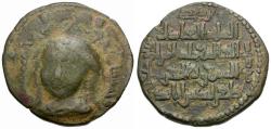 World Coins - Islamic. Artuqids of Hisn Kayfa and Amid. Fakhr al-Din Qara Arslan (AH 543-570 / AD 1148-1174) Æ 30mm Dirham