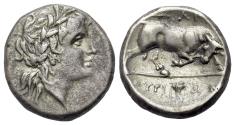 Ancient Coins - ITALY, Lucania. Thourioi, c. 280 BC. AR Stater. Reduced standard. Laureate head of Apollo. R/Bull butting right; ARI above, tripod in exergue