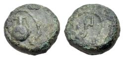 Ancient Coins - Central Italy, Uncertain, c. 1st century BC. Æ 11mm. Round-bodied amphora R/ Strigil