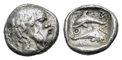 Ancient Coins - Island of Thrace. Thasos, c. 412-404 BC. AR Hemiobol. Head of satyr R/ Two dolphins