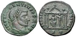 Ancient Coins - Maxentius (A.D. 306-312). AE Follis. Ticinum mint. R/ CONSERV VRB SVAE, Victory crowning Romain tetrastyle temple