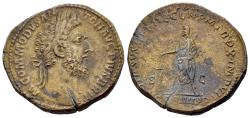 Ancient Coins - Commodus (177-192). Æ Sestertius. Rome, AD 185. R/ Commodus standing l., sacrificing over lighted tripod
