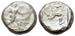 Ancient Coins - Pamphylia, Aspendos, c. 465-430 BC. AR Stater. Warrior, nude but for helmet, holding sword and shield R/ Triskeles within incuse square